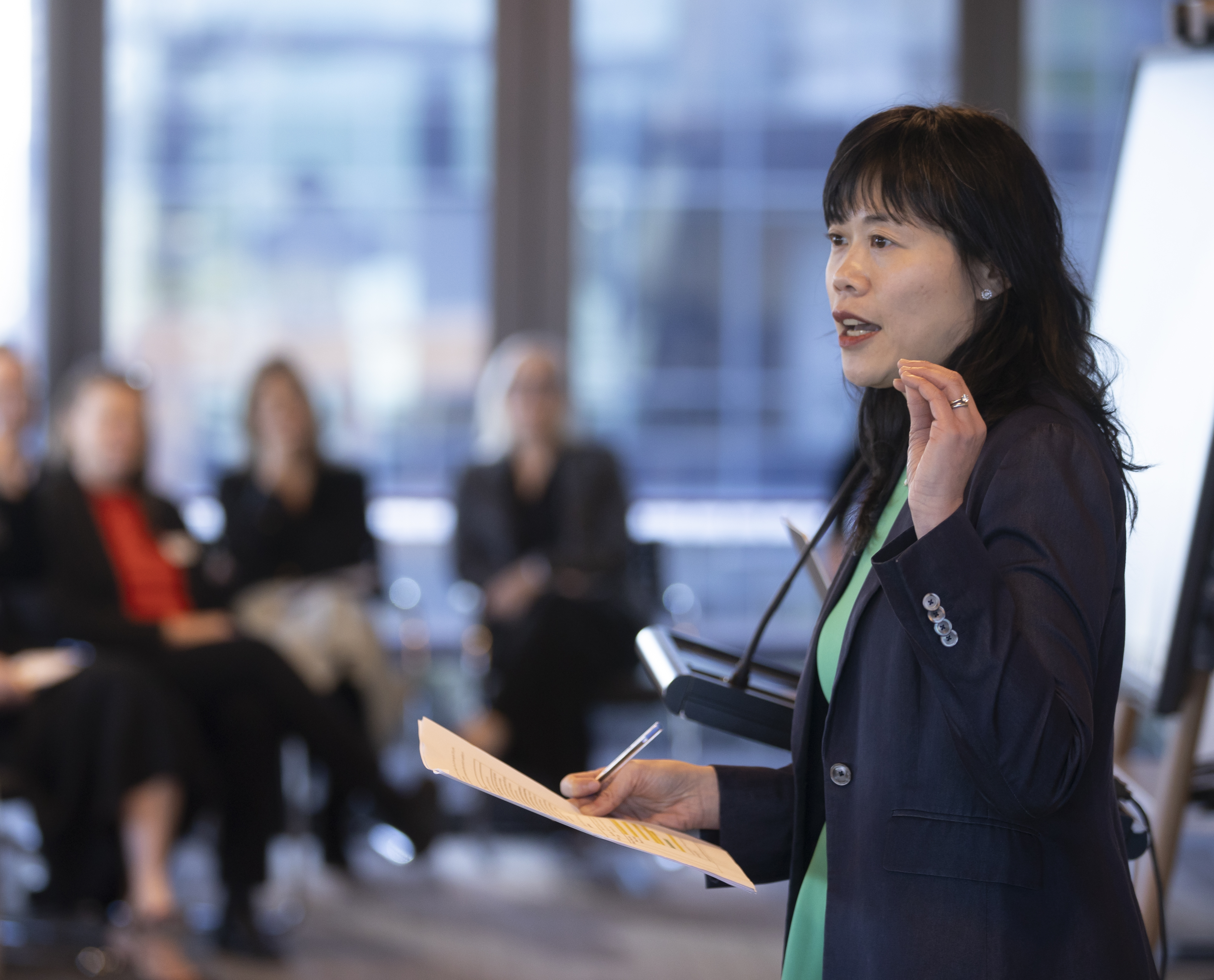 Alice Tang with industry leaders at 100 Women in Finance